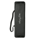 Folded Dream On Me Nest playard in black carrying bag with shoulder strap and Dream On Me logo on white background