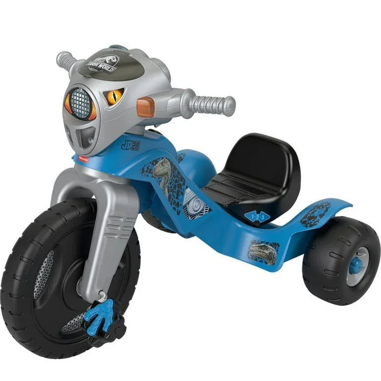 Three-quarter view of Fisher-Price Velociraptor tricycle with dinosaur-head handlebars, blue body and black seat on white background