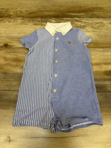 Front view of blue Ralph Lauren Polo shortie romper with white collar, vertical stripes, button placket, and wood background