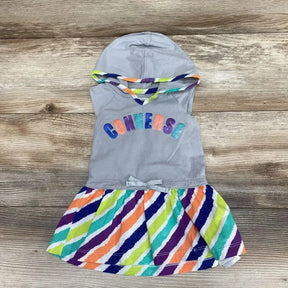 Flat-lay gray Converse hooded dress (6–9m) with rainbow CONVERSE letters, silver bow, and multicolor striped skirt on wood