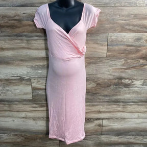 Front view of pink maternity off-the-shoulder midi dress showing wrap bodice and short sleeves against wood background
