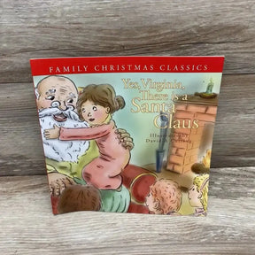 Front cover of Yes, Virginia, There Is a Santa Claus paperback book showcasing Santa and a child illustration with a wood-grain background