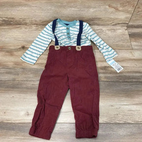 Flat lay of 18M Henley bodysuit with teal stripes and burgundy corduroy suspender pants with navy straps on wood floor